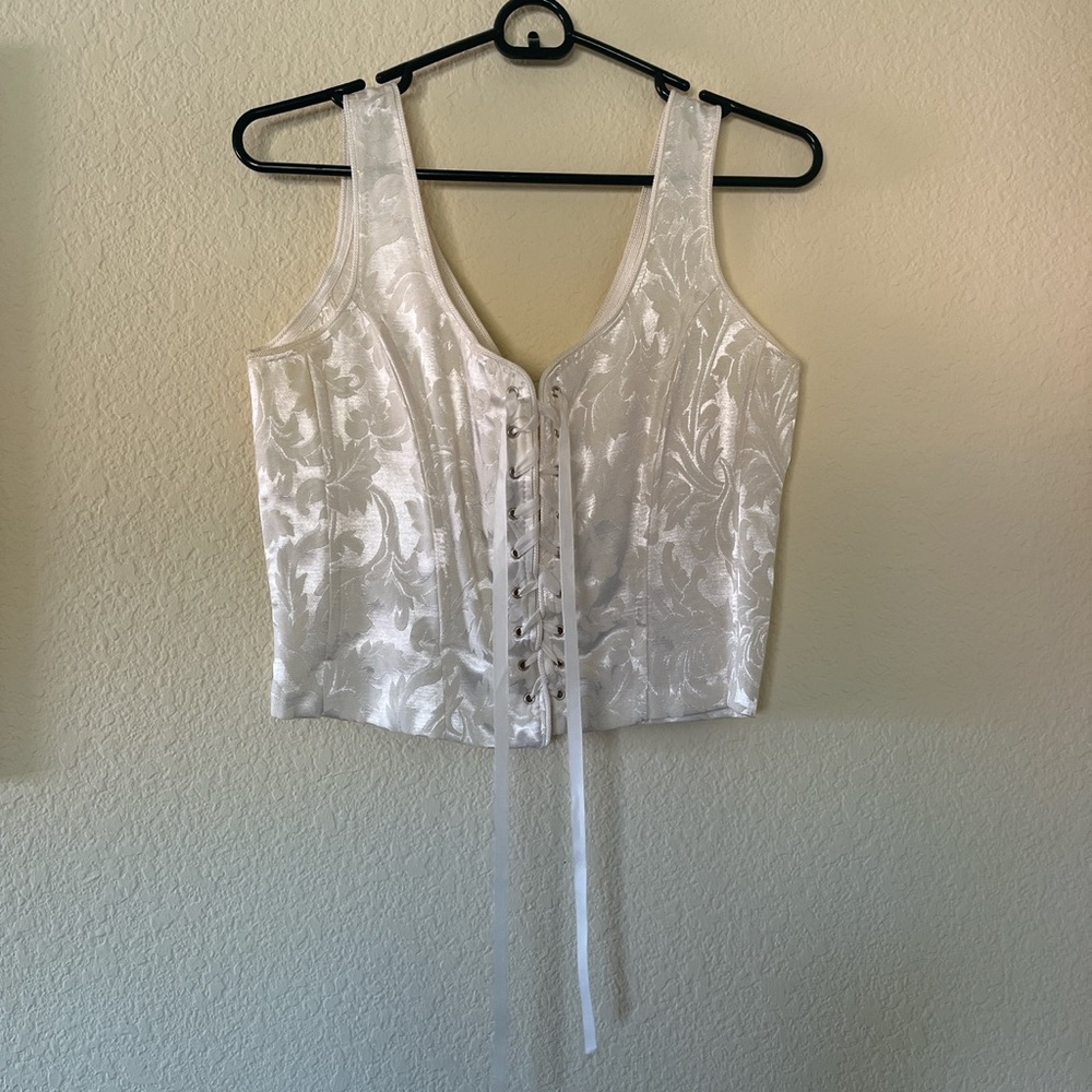 White corset with floral patterns